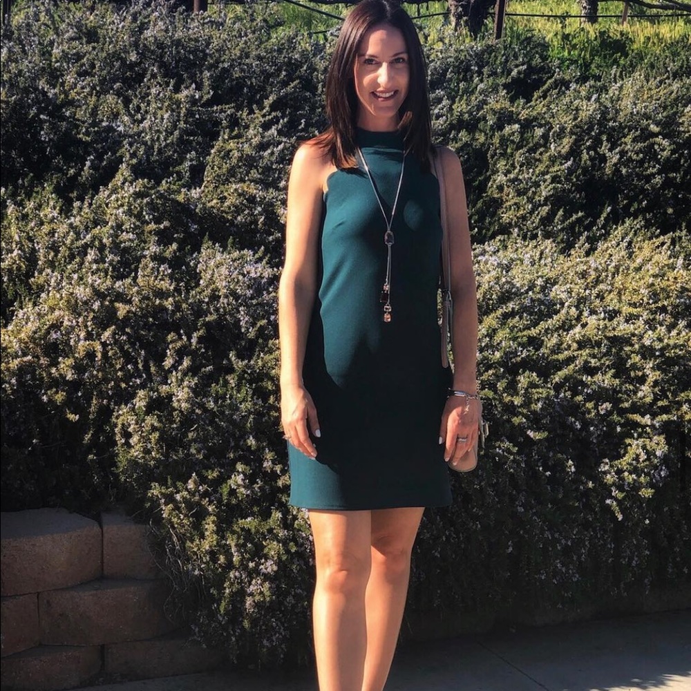 Dark green scallop dress.